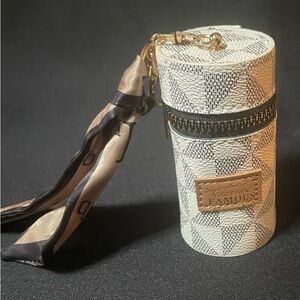 CYLINDER SHAPED KEY CHAIN or BAG CHARM.